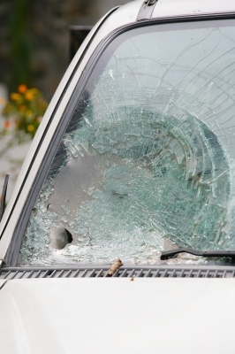 We all hope that we never get into a car accident, but most of us will be involved in one at some point. If and when it happens to you, here are five things you should do following a car accident. Broken windshield from accident.